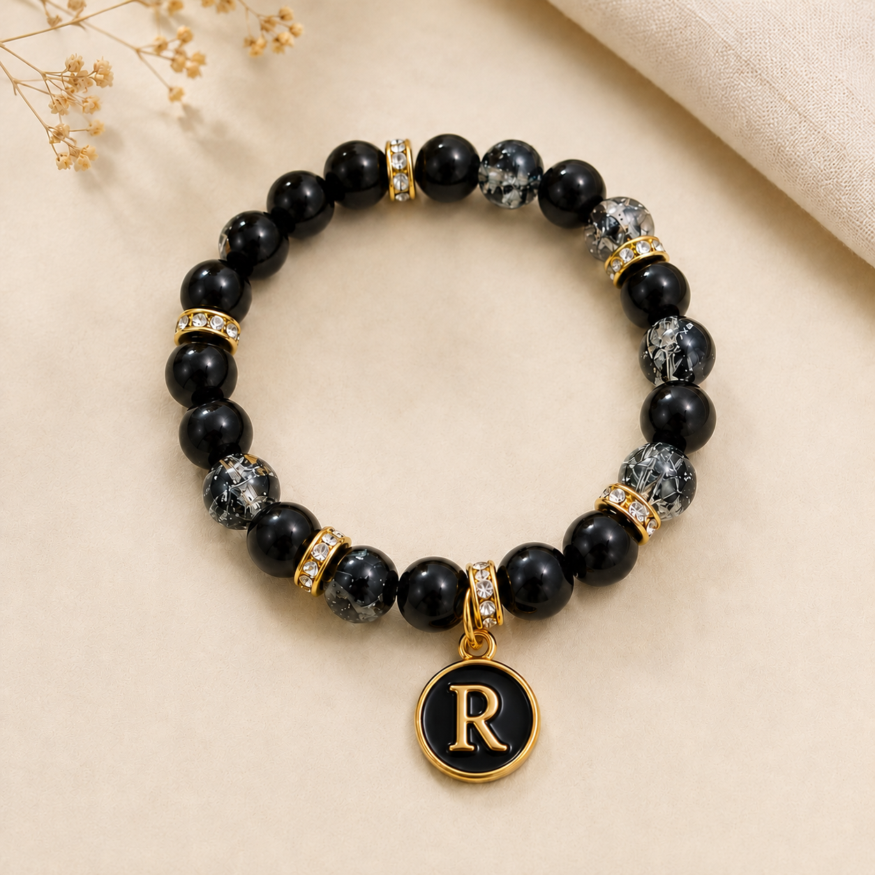 R letter Black and Golden Bracelet